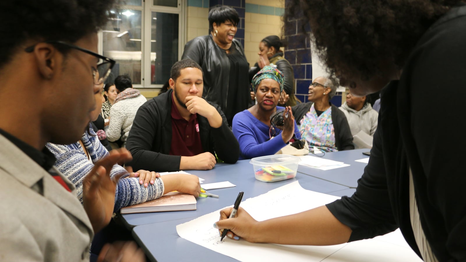Newark residents wrote down challenges and opportunities in the district during Wednesday’s forum.