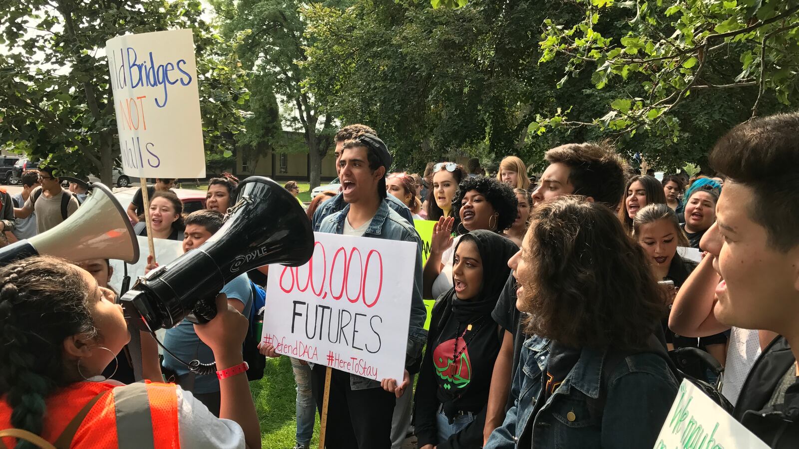 Denver students chant after walking out of school on September 5, 2017 to protest Trump's decision to end DACA.