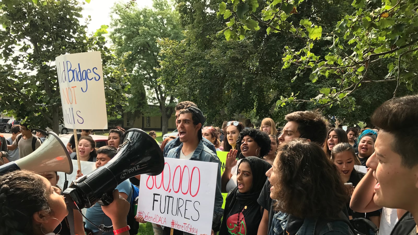 Denver students chant after walking out of school on September 5, 2017 to protest Trump's decision to end DACA.