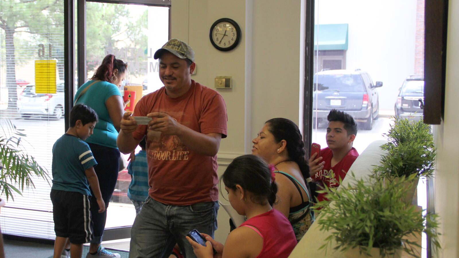 A Memphis parent receives his Shelby County Schools parent access ID, which will allow him to enter his children's school building.