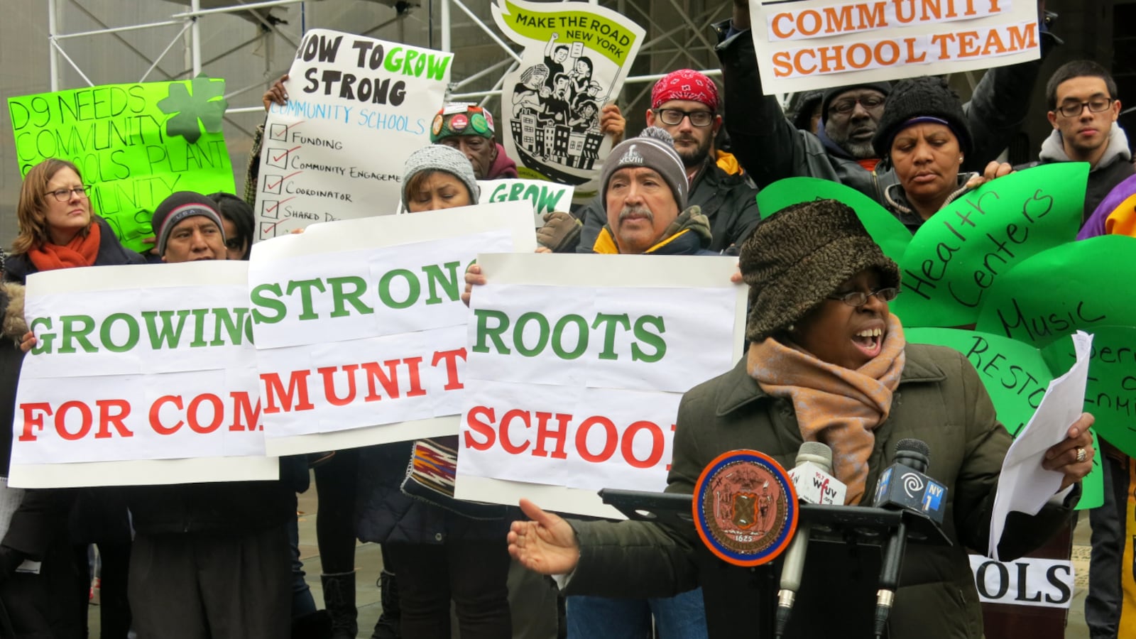 Claudette Agard, a member of the Coalition for Educational Justice, called on the city to adopt a formal community school policy.