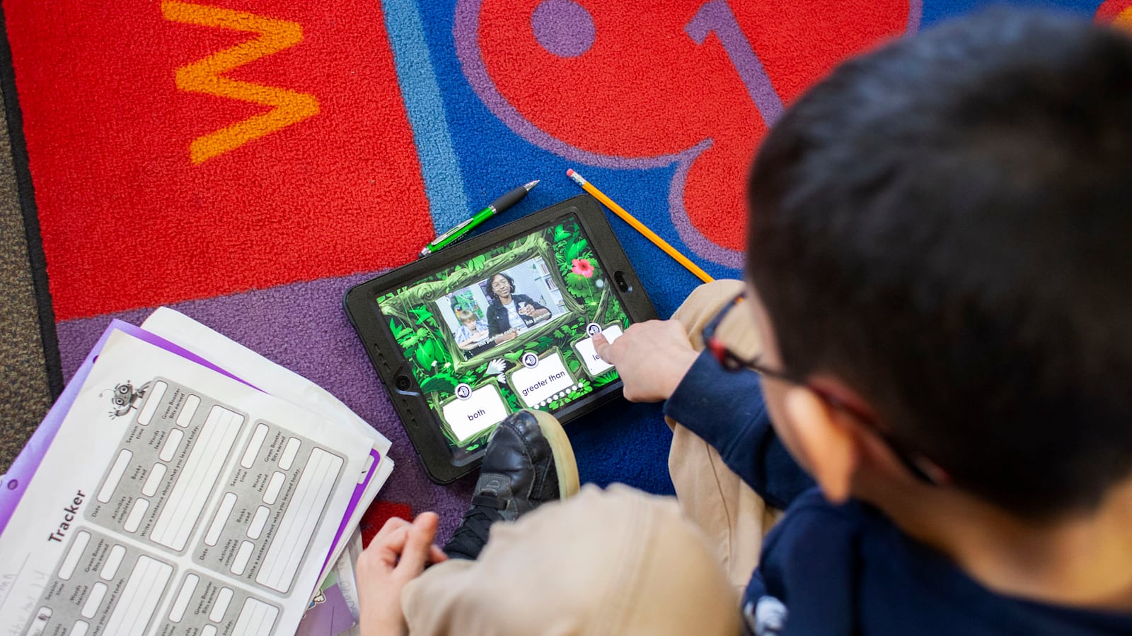 Jonathan C. selects an answer to a question on a digital learning program during class at CICS West Belden. The Chicago charter school employs the personalized learning method for its K-8 students. The school is part of the Chicago International Charter School network, and is managed by Distinctive Schools. Photo by Stacey Rupolo/Chalkbeat NOTE: Last names not given by school