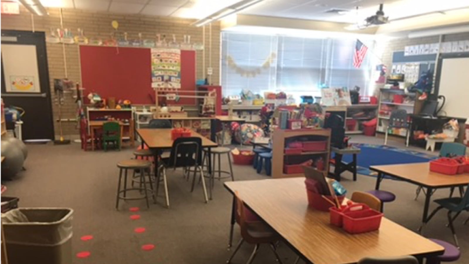Aurora kindergarten teacher Laura Henry provided the pencil totes, floor dots, balls and wiggle seats, and everything you see on the shelves out of her own pocket.
