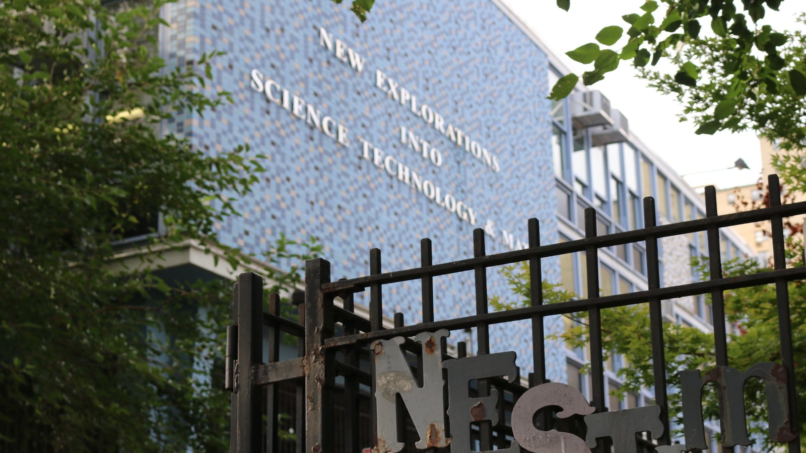 A photograph of the outside of the New Explorations into Science Technology and Math building.