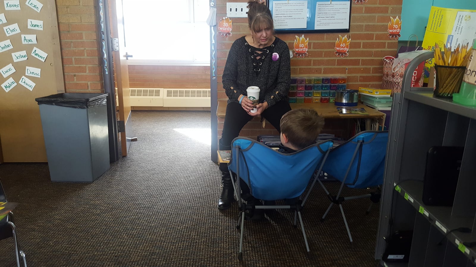 Principal Stacy Bedell listens to a student at Eiber Elementary in Jeffco Public Schools.