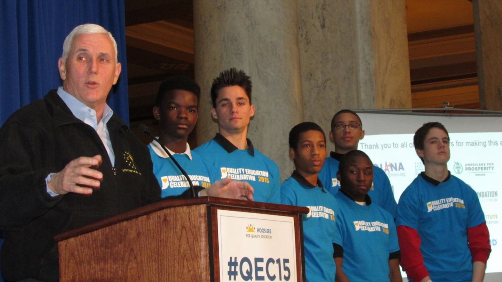 Gov. Mike Pence speaks to private and charter school students this morning as Herron High School students look on.