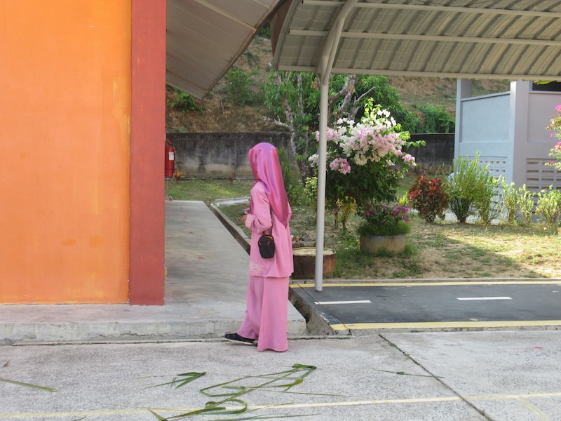 Photo of a girl dressed in all pink and wearing a pink hijab.