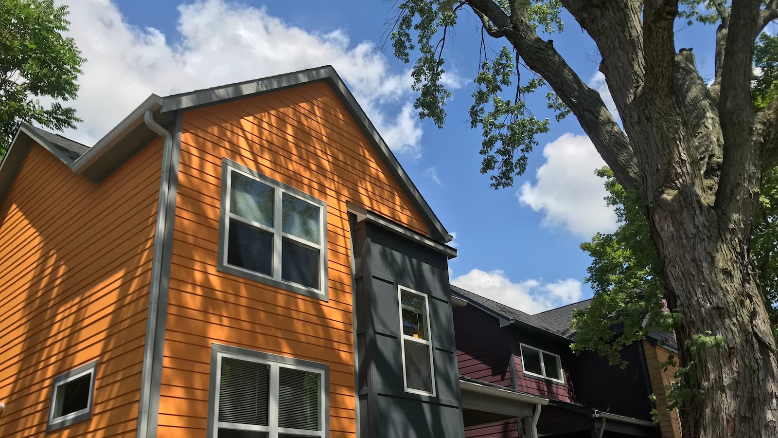 The Educators' Village is a two-block cluster of 22 new and restored bold-colored homes in the St. Clair Place neighborhood. Though marketed to teachers, the homes are set at below-market prices for anyone within a low- to middle-income cap.