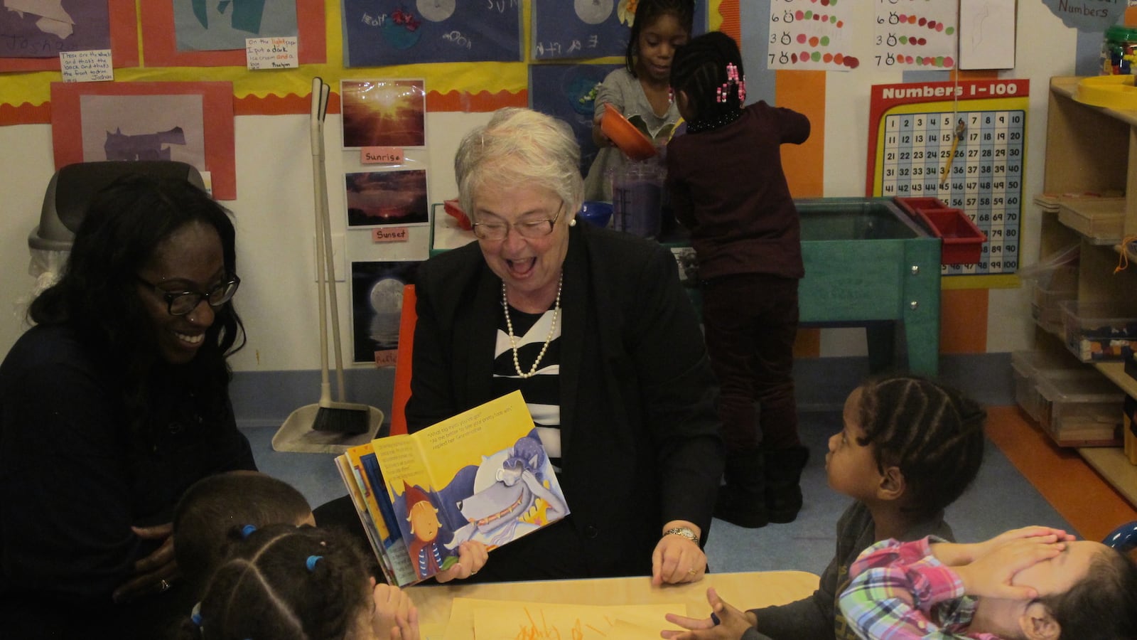 New York City schools Chancellor Carmen Fariña reads to children at Sunshine Learning Center in the Bronx in 2015.