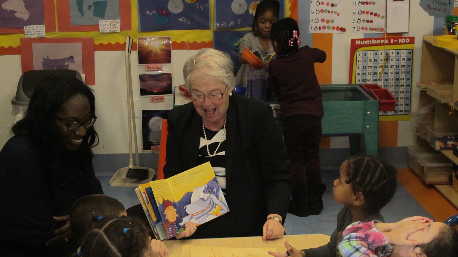 New York City schools Chancellor Carmen Fariña reads to children at Sunshine Learning Center in the Bronx in 2015.