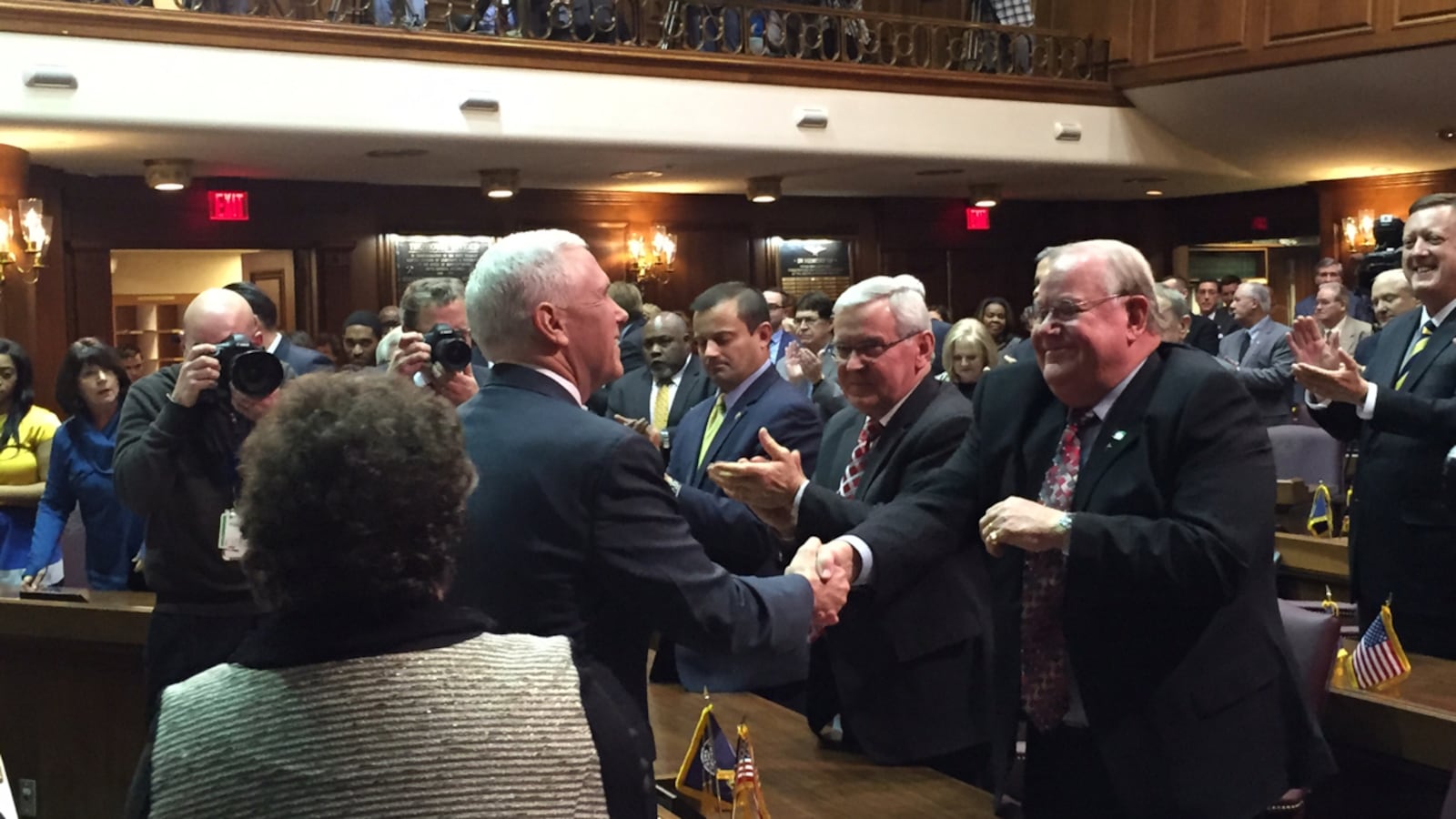 Gov. Mike Pence greets Republican lawmakers after his State of the State address Tuesday night.
