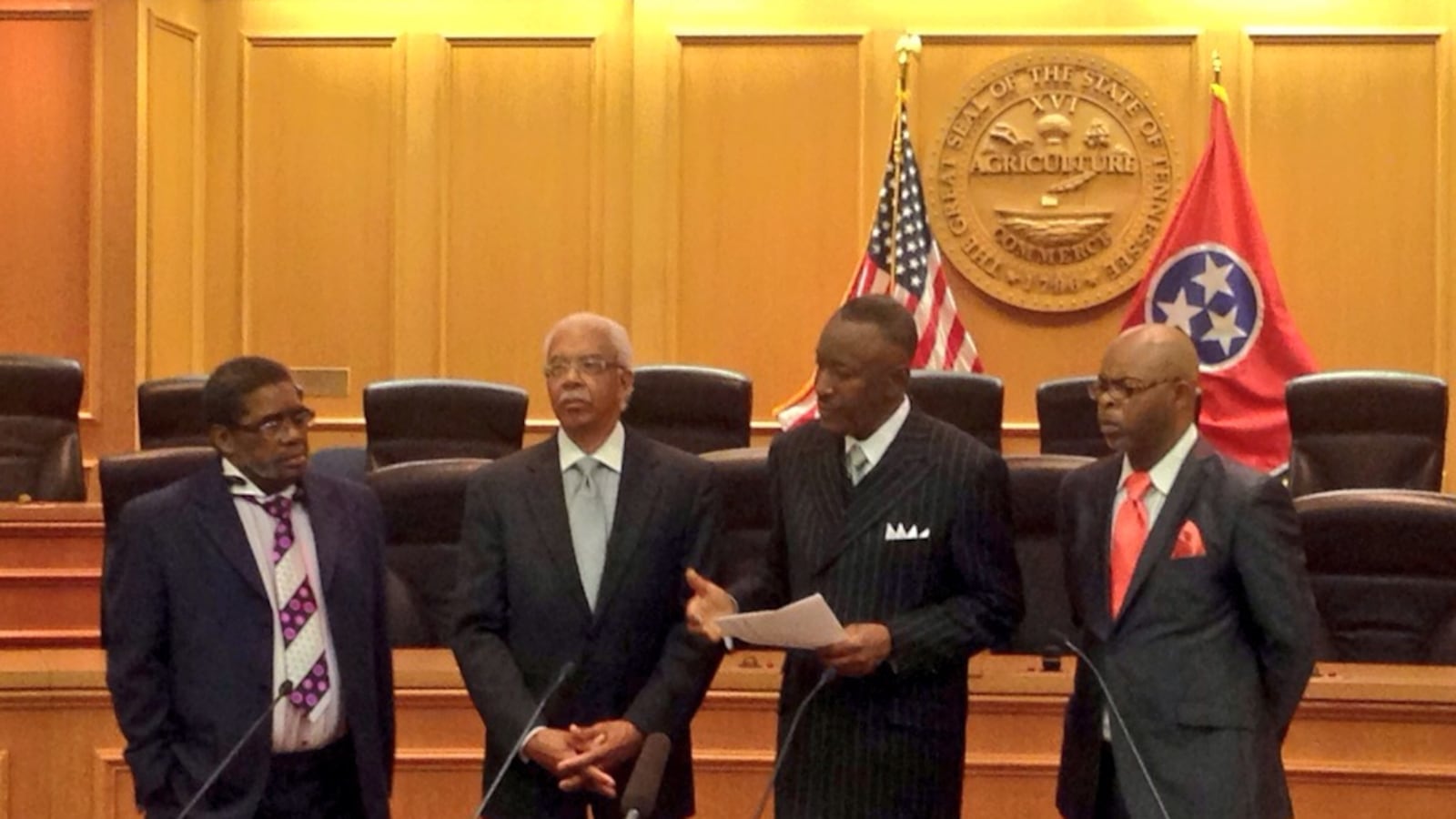 Pastors affiliated with the Memphis chapter of the Southern Christian Leadership Conference present a petition at the State Capitol supporting voucher legislation.