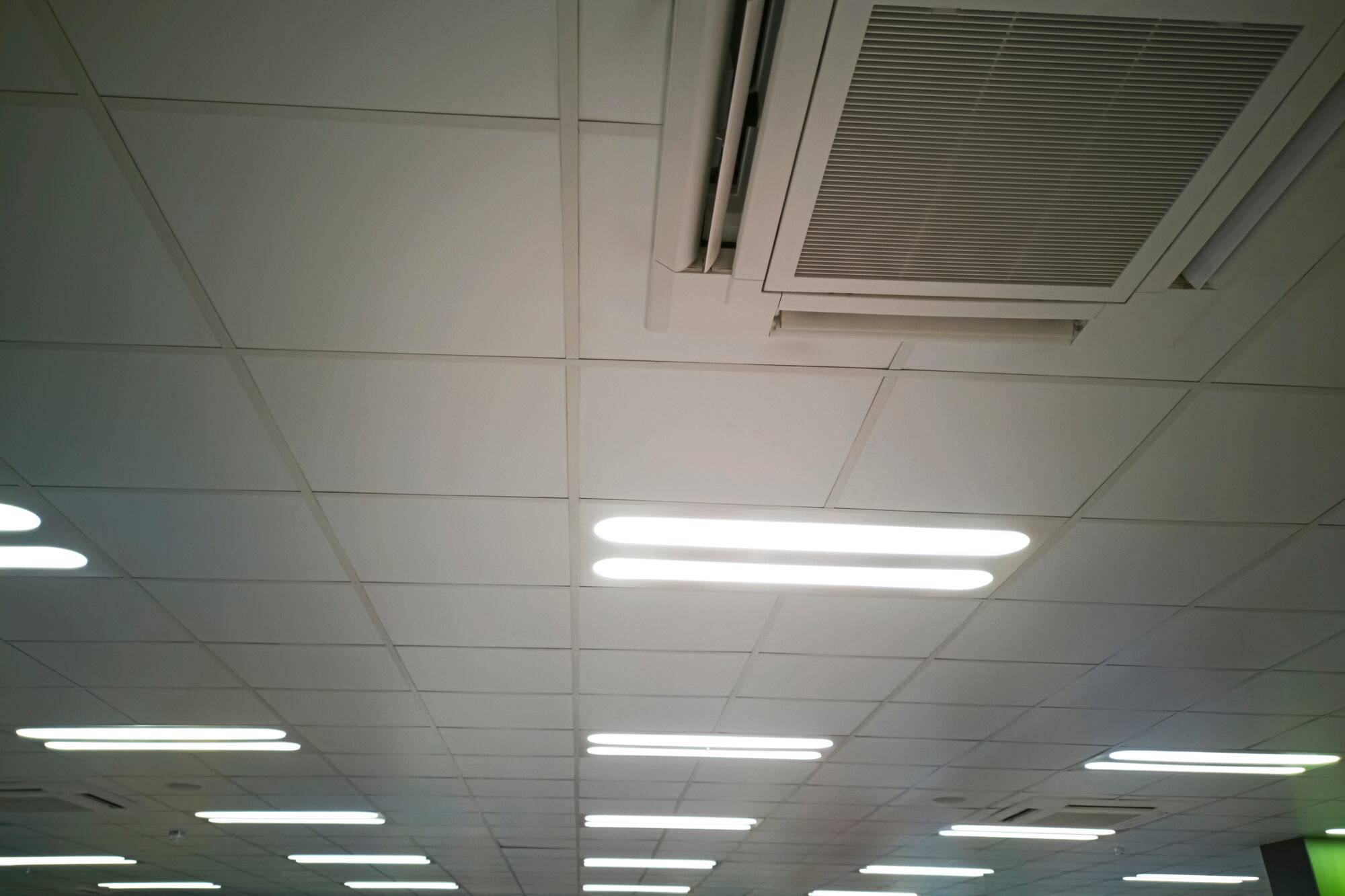 Air conditioning ventilation ducts and light in a building.