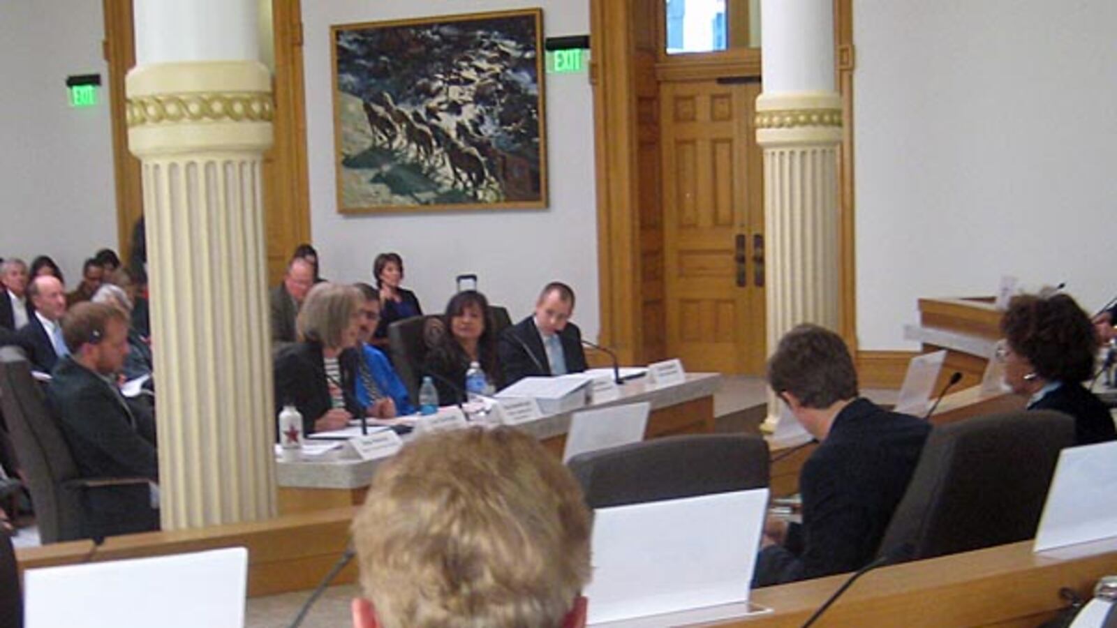 Members of the testing task force presented to legislators Wednesday in the Capitol's new - but somewhat pillar-obstructed - hearing room.