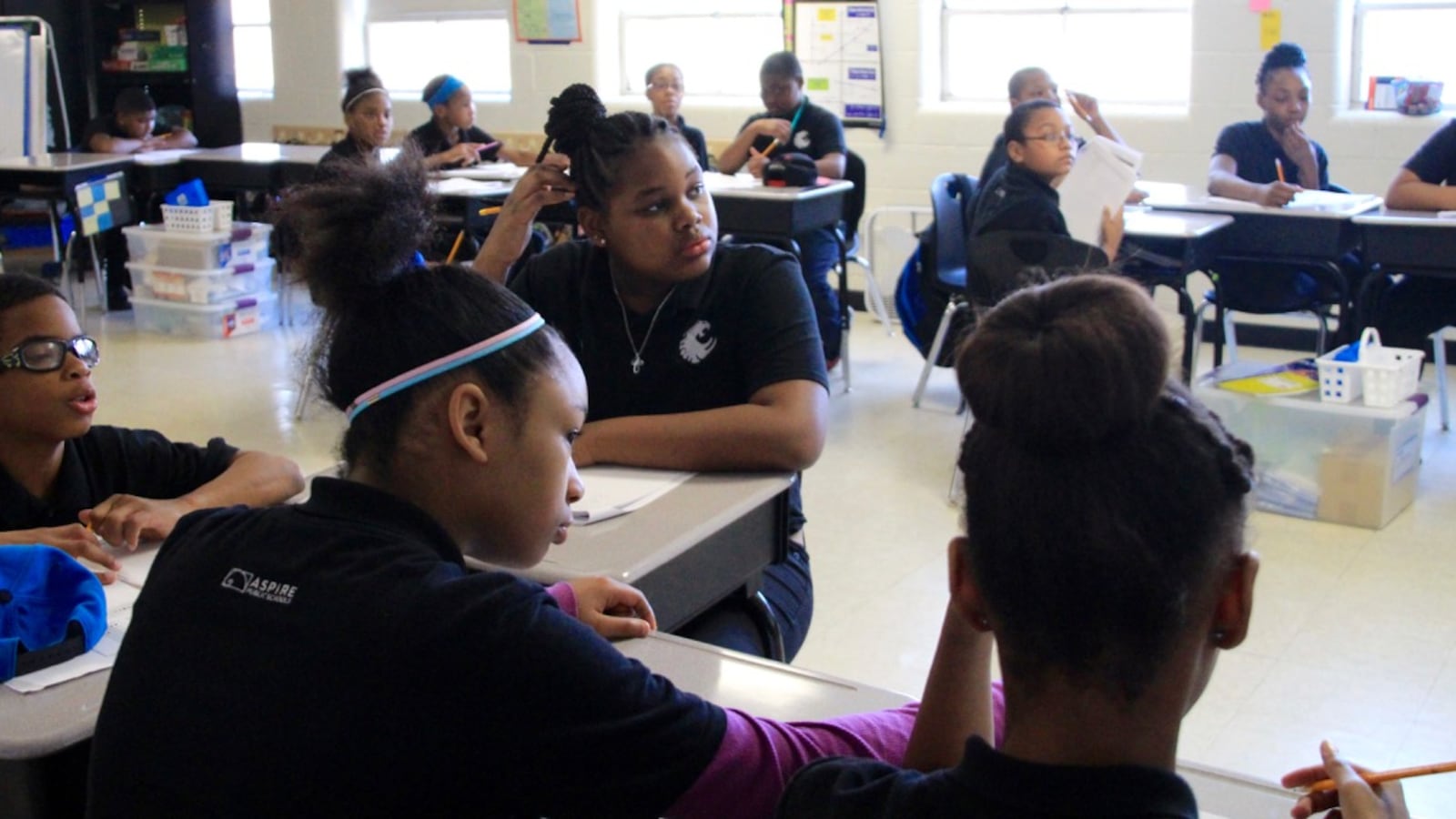 Students at Aspire Coleman listen during a sixth-grade math class. The Memphis charter school has changed its disciplinary practices in recent years to be more informed about the effects of emotional trauma, especially among female black students.