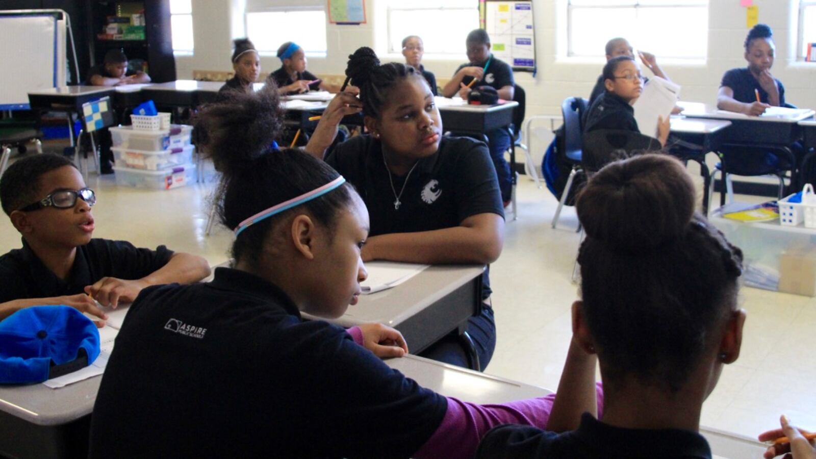Students at Aspire Coleman listen during a sixth-grade math class. The Memphis charter school has changed its disciplinary practices in recent years to be more informed about the effects of emotional trauma, especially among female black students.