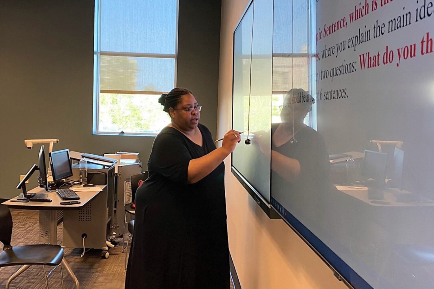 Ivy Tech Community College overhauled remedial education over the last decade. Leaders said the changes have helped substantially more students graduate on time. Tiffani Butler is teaching English 111, which is required for many students, in Indianapolis.