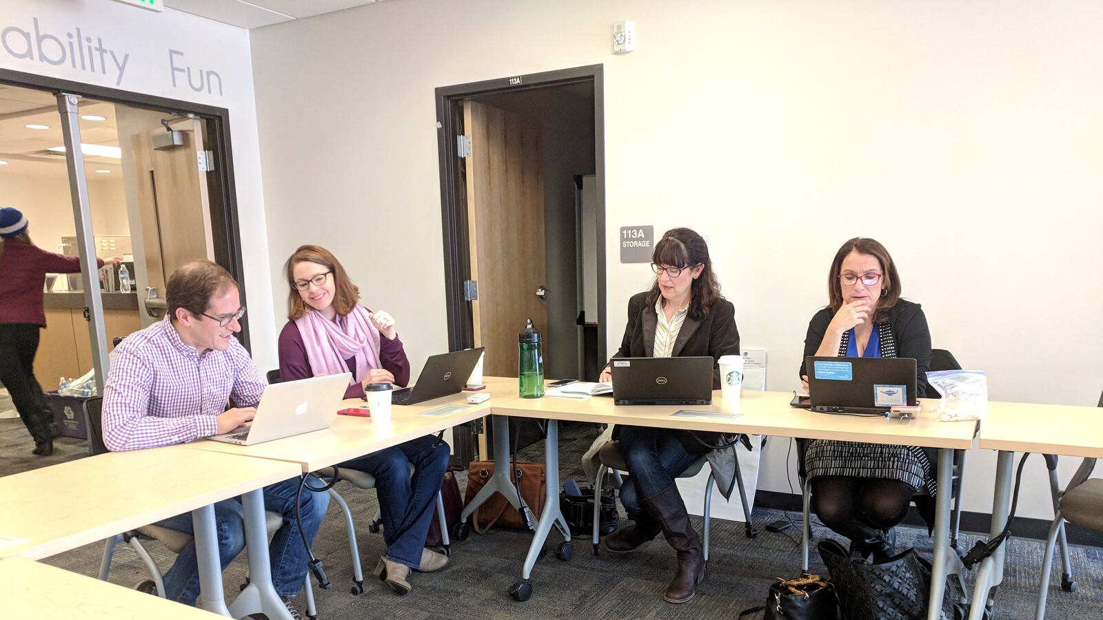 Denver Public Schools Chief Financial Officer Mark Ferrandino, left, general counsel Michelle Berge, Chief Human Resources Officer Debbie Hearty, and Superintendent Susana Cordova sit at the bargaining table Sunday without any union counterparts.