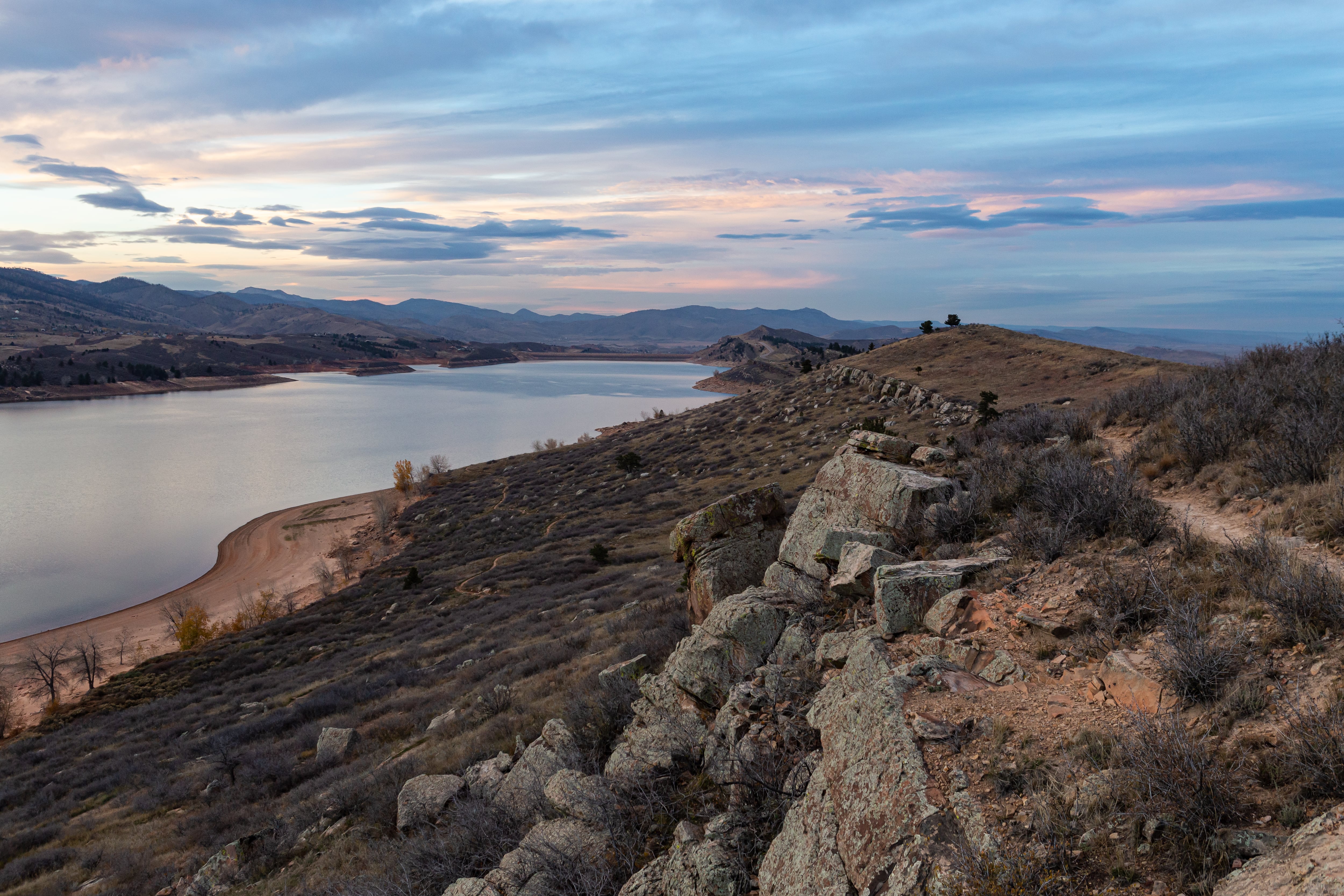 A late-day scenic photo of Horsetooth Reservoir in Fort Collins, Colorado.