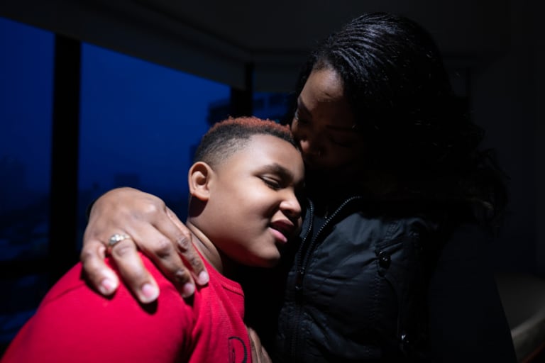 JaNay Dodson poses with her son, Braylin Harvey, in their Hyde Park building on Wednesday, March 17, 2021.