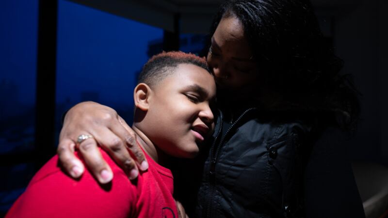 JaNay Dodson poses with her son, Braylin Harvey, in their Hyde Park building on Wednesday, March 17, 2021.