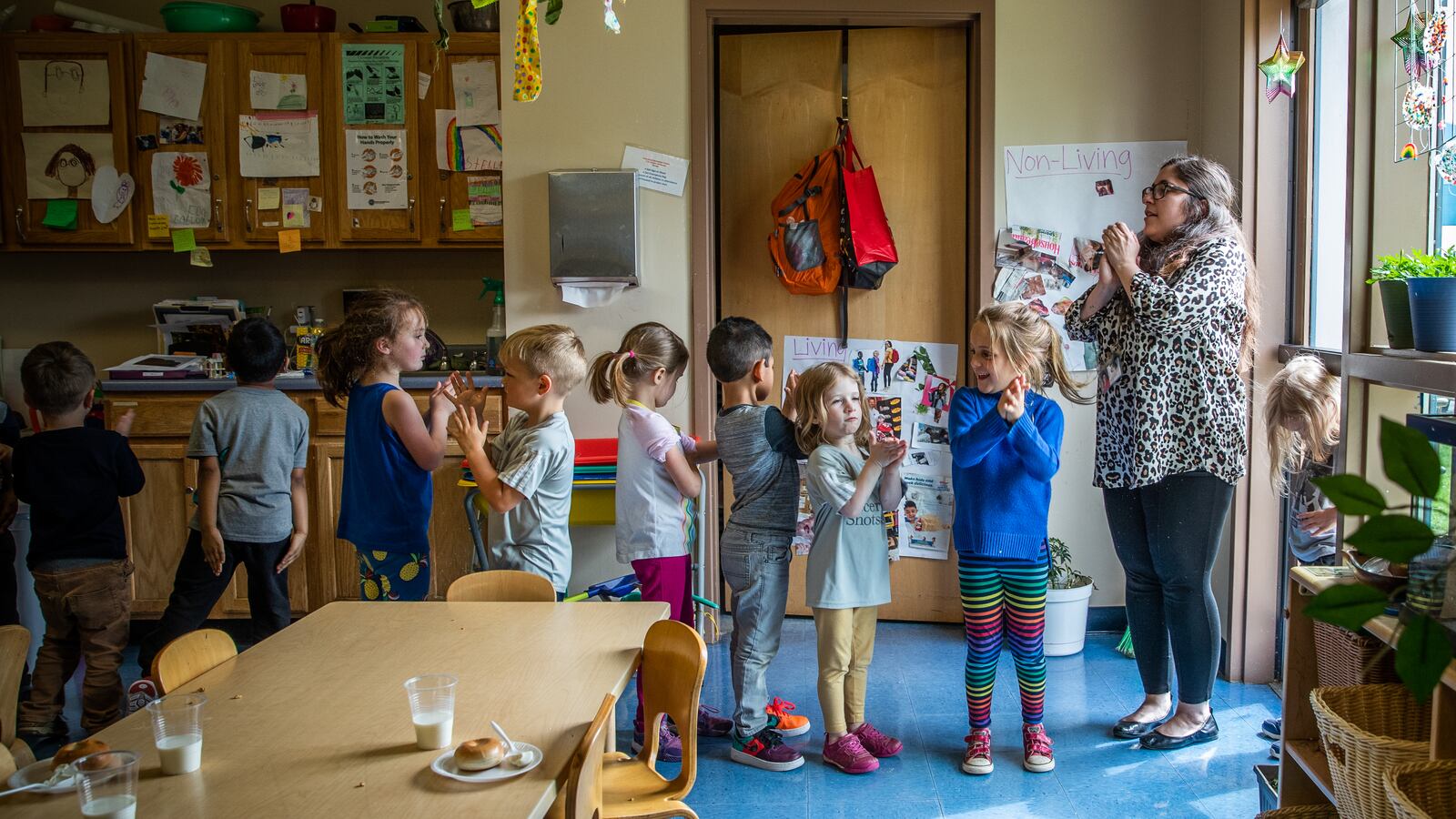 Pre-kindergarten lead teacher Elizabeth Dobrow (right) preps her class to line up before going outside to play at IU Health Day Early Learning Center in Indianapolis on Tuesday, May 14, 2019.