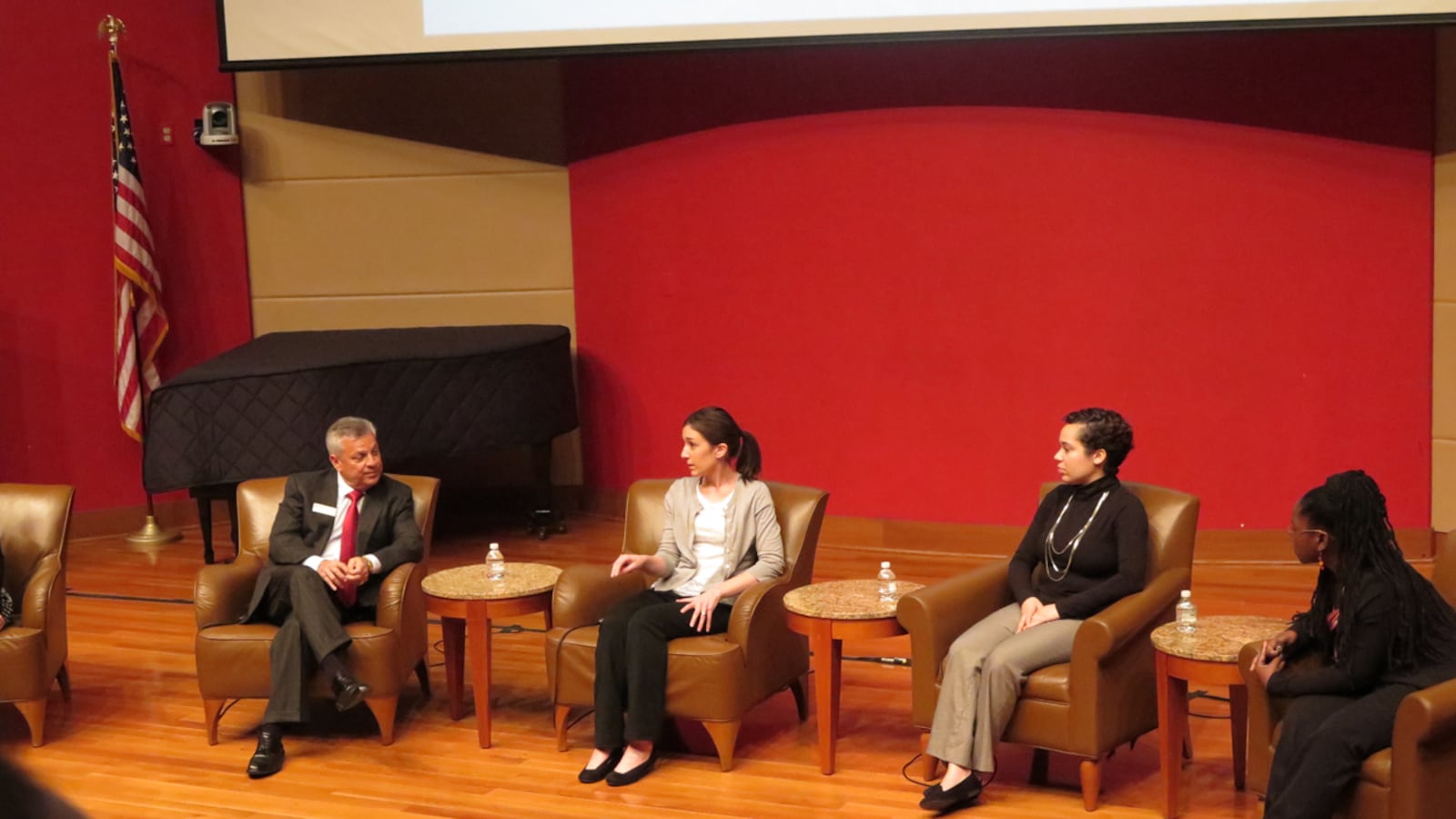 Dean Gerardo Gonzalez, of Indiana University's College of Education, and teachers Natalie Merz, Adriana Rivera and Tayana Dowdell discussed teacher preparation and the realities of teachers' jobs at an event Tuesday night.