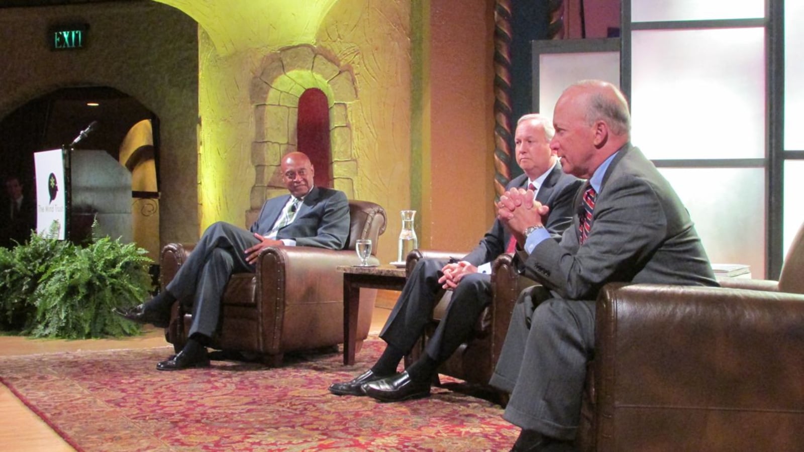 Kevin Chavous (left) leads a panel discussion with former Indianapolis Mayor Bart Peterson (center) and former Gov. Mitch Daniels.
