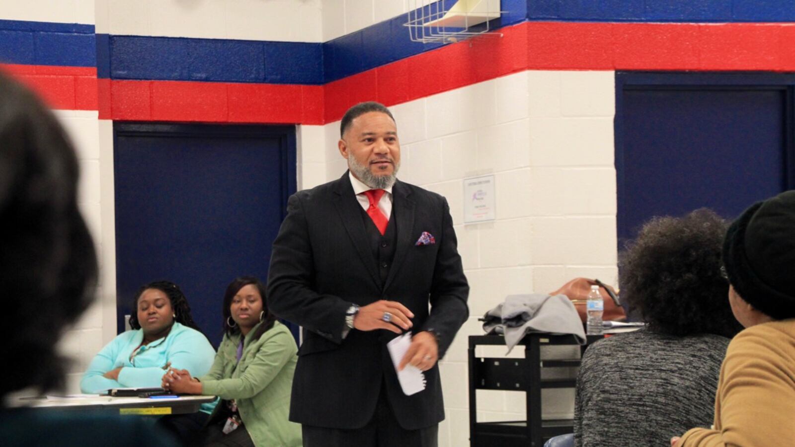 Bobby White, who founded Frayser Community Schools in 2014, speaks to community members at Westside Middle.