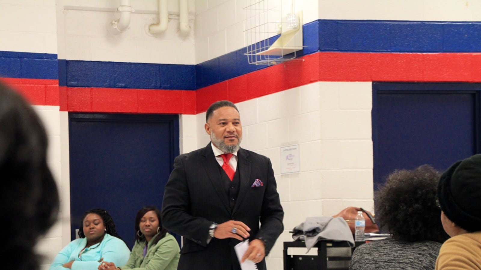 Bobby White, who founded Frayser Community Schools in 2014, speaks to community members at Westside Middle.