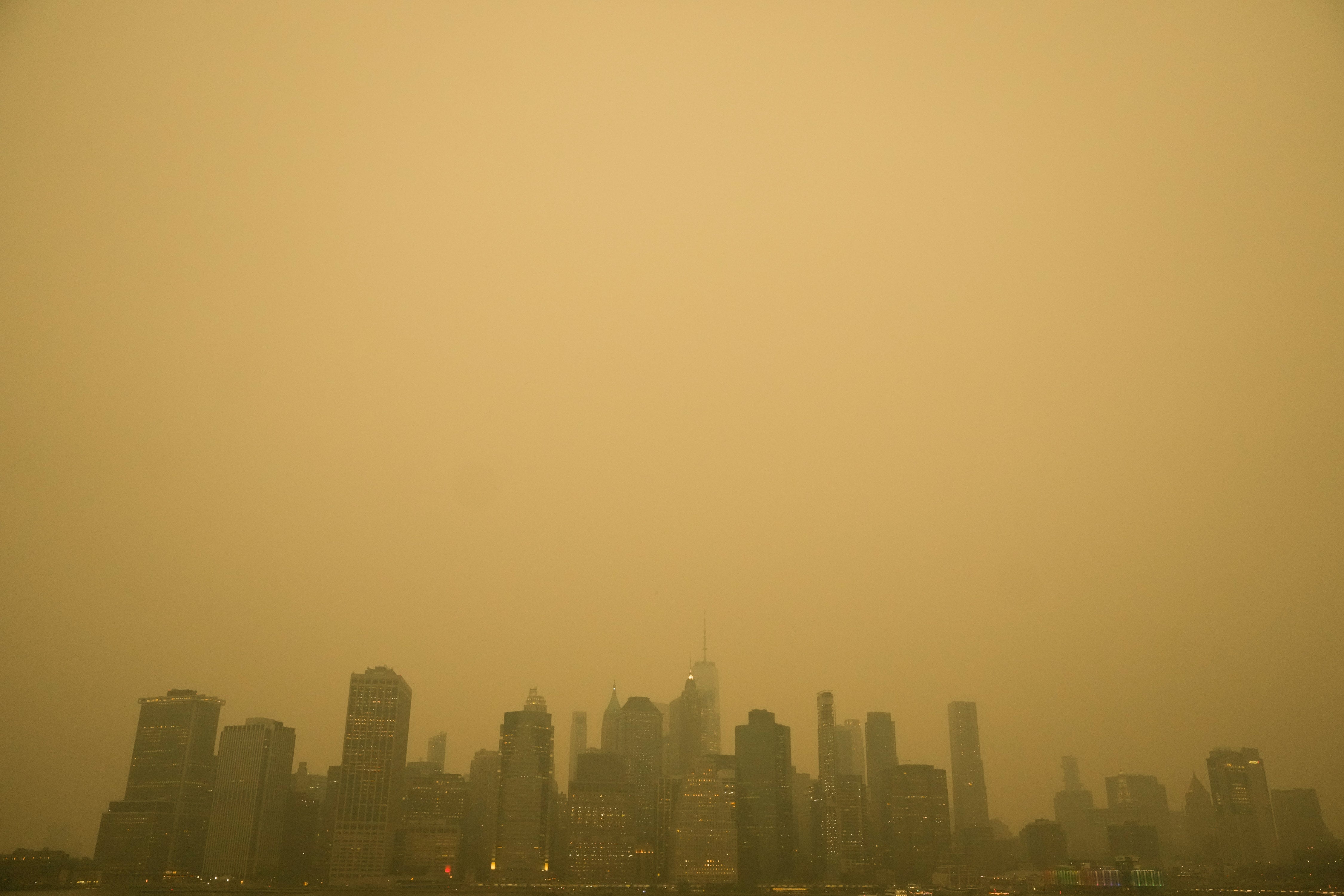 A yellow pall of pollution hangs over NYC’s skyline.