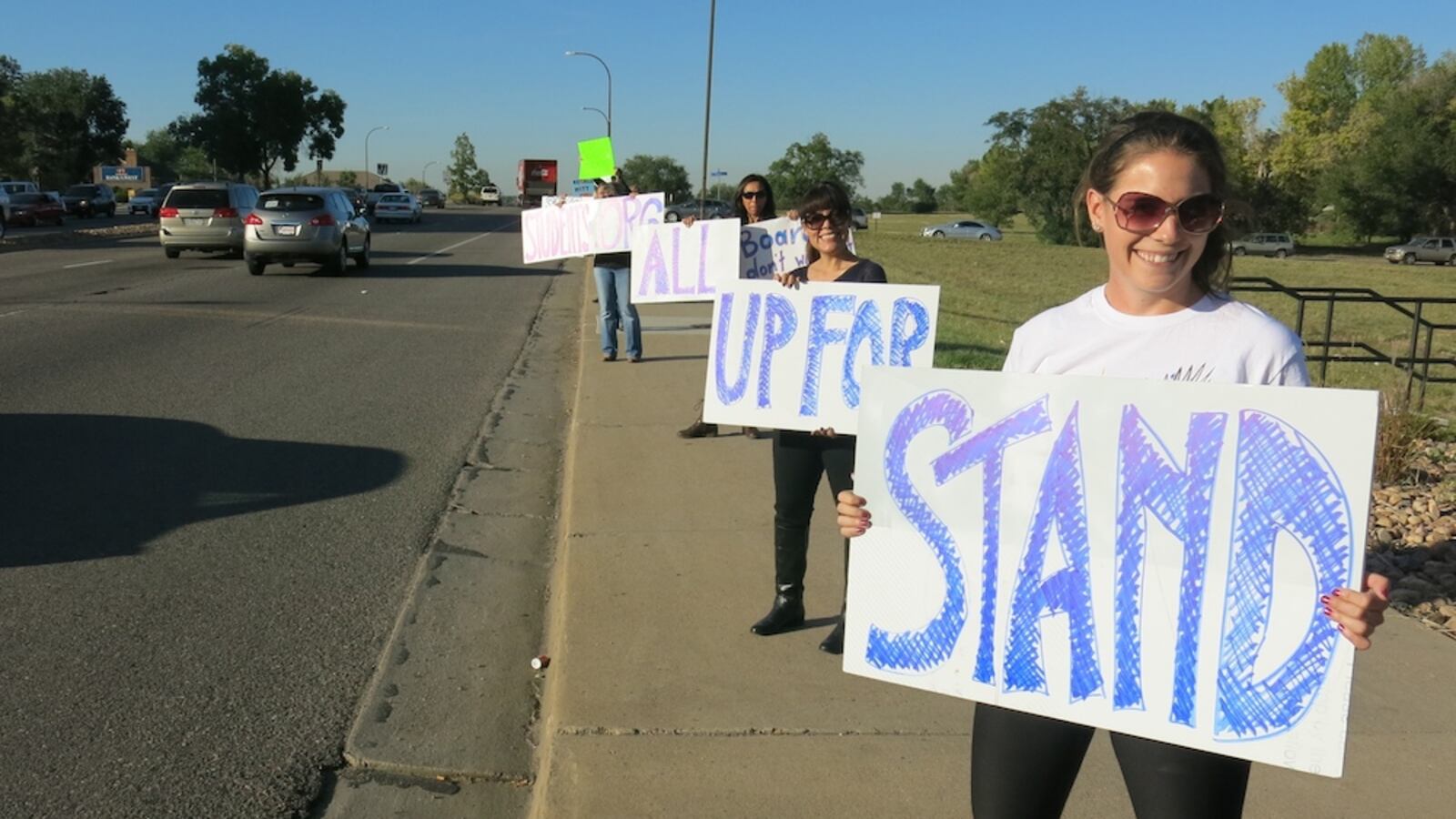 Jeffco Public Schools teacher Audrey Truesdale rallied with more than 100 other educators, parents, and students Friday evening to raise awareness for their concerns about the county's school board majority.