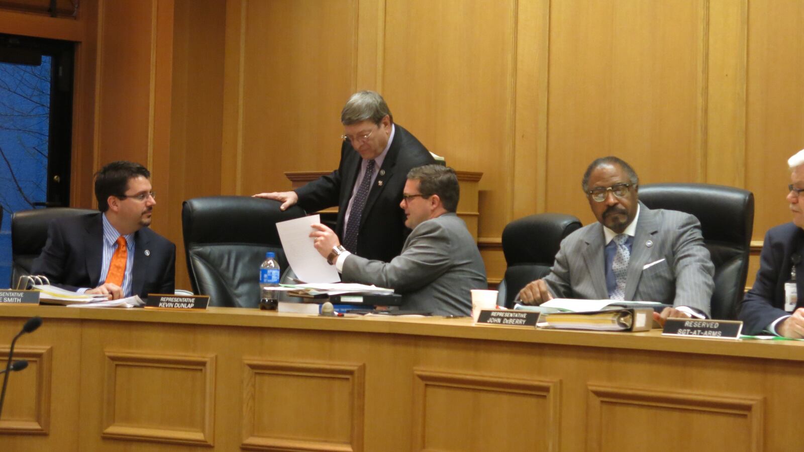 Rep. Harry Brooks (R-Knoxville) and Rep. Kevin Dunlap (D-Rock Island) discuss legislation prior to a House education panel on Tuesday. Lawmakers are discussing numerous bills related to Tennessee's Common Core State Standards.