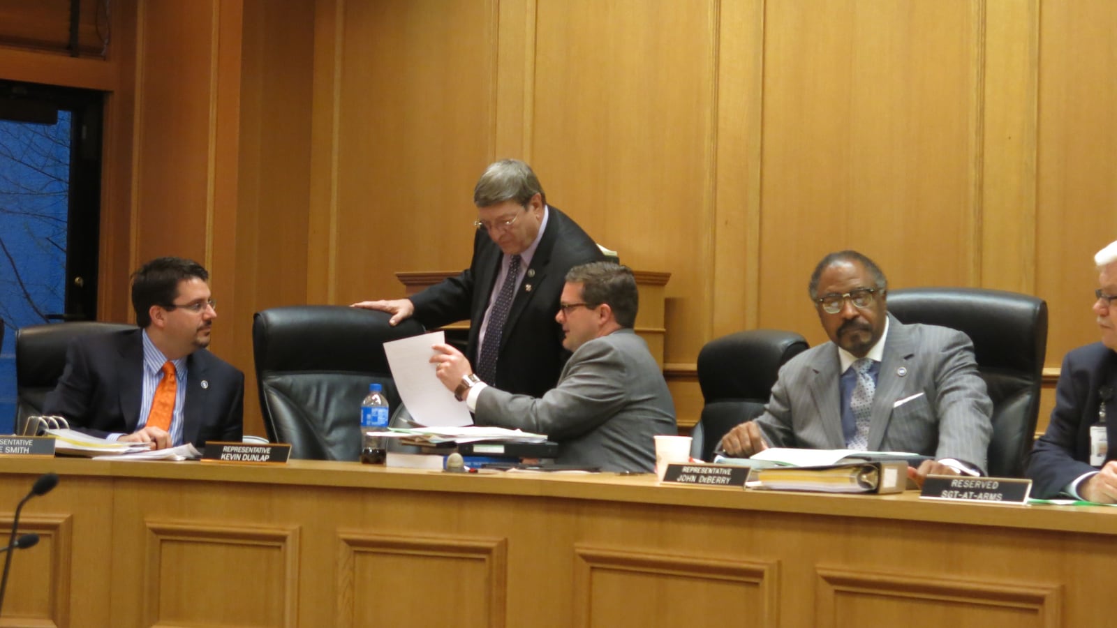 Rep. Harry Brooks (R-Knoxville) and Rep. Kevin Dunlap (D-Rock Island) discuss legislation prior to a House education panel on Tuesday. Lawmakers are discussing numerous bills related to Tennessee's Common Core State Standards.