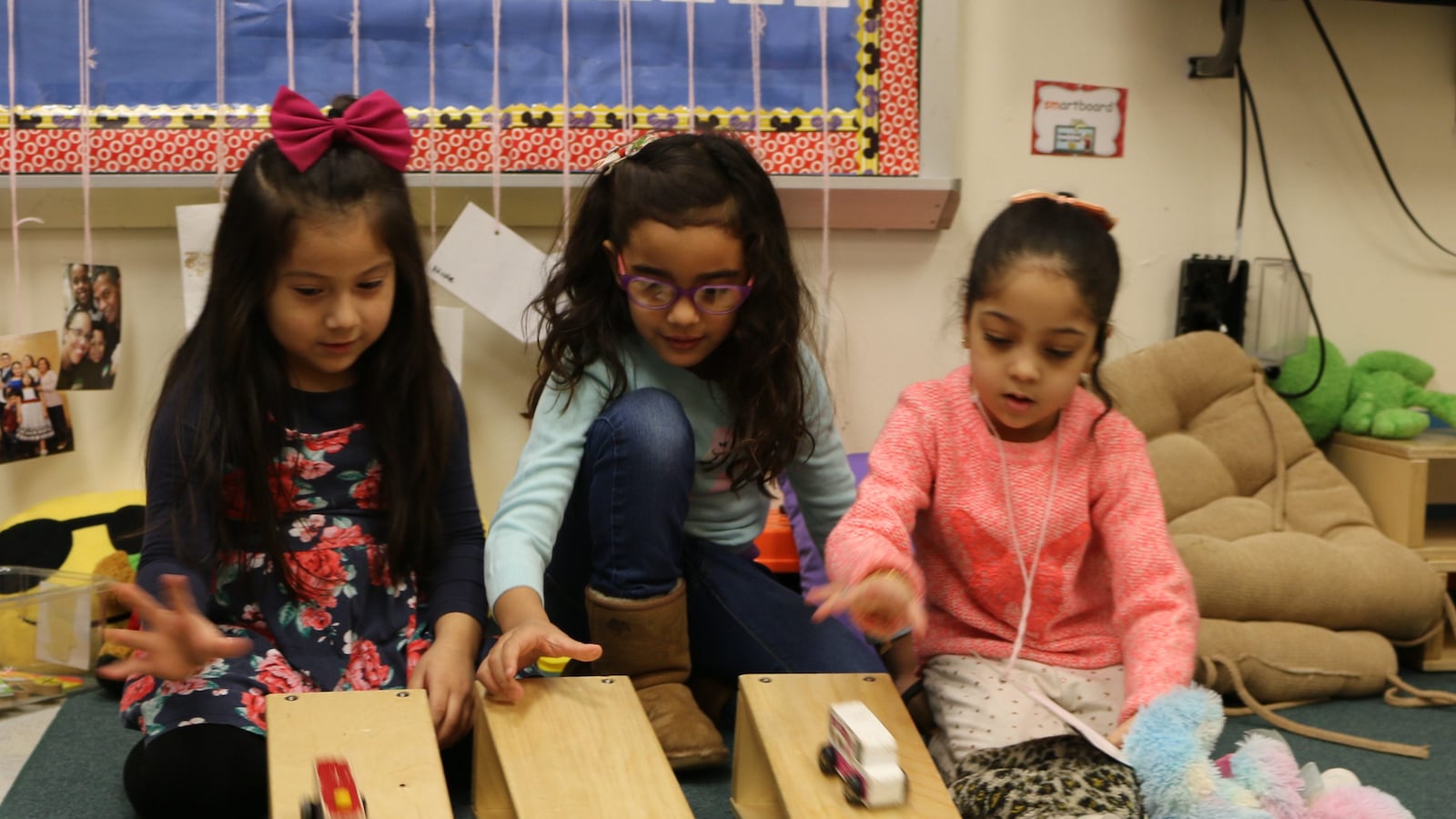 Pre-K students play during center time at The Renaissance Charter School in Jackson Heights, Queens. New York City earned high marks in a national review of pre-K programs.