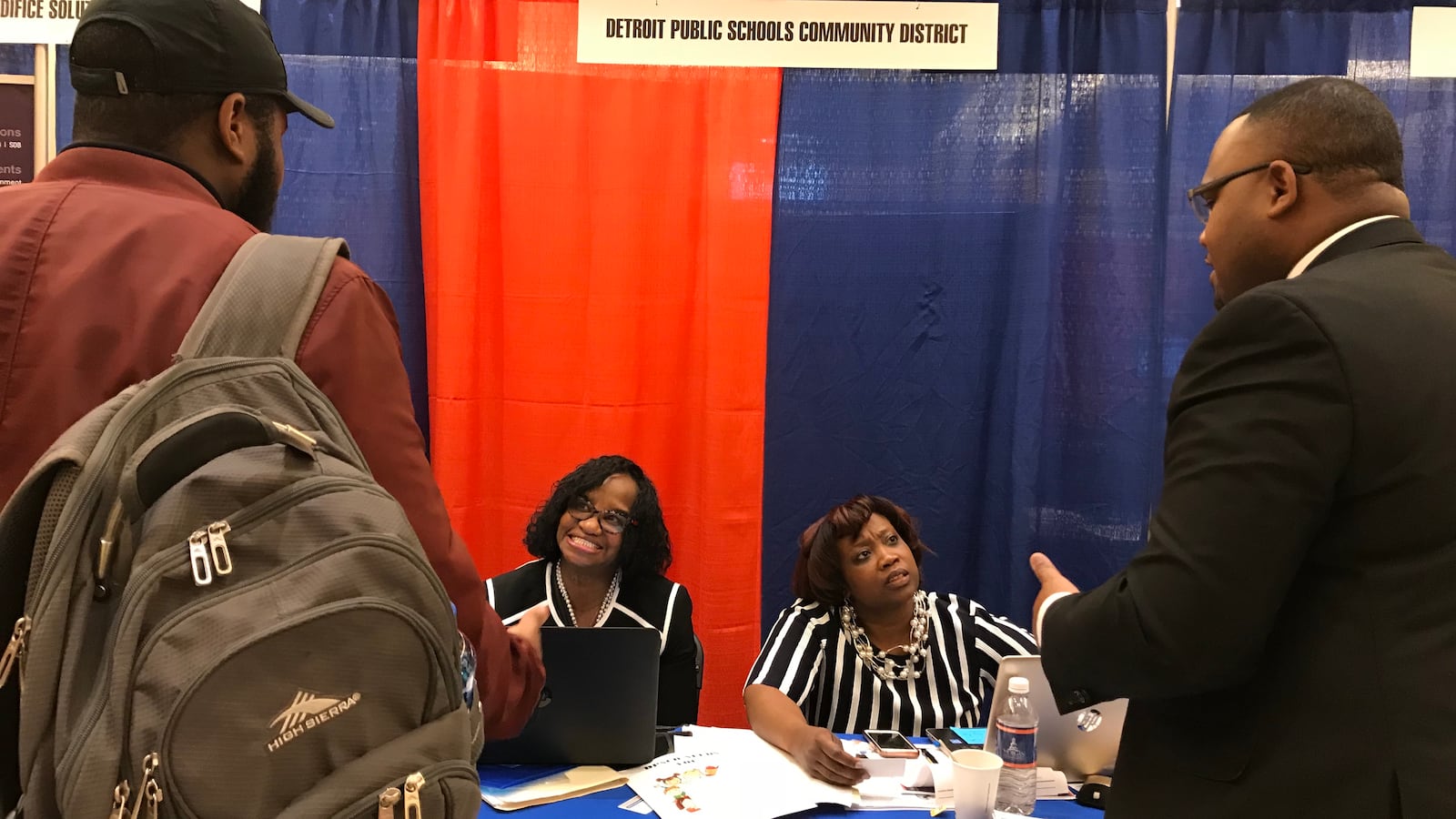 Recruiters Edwina Dortch and Asenath Jones chat with passersby at Morgan State University's spring career fair