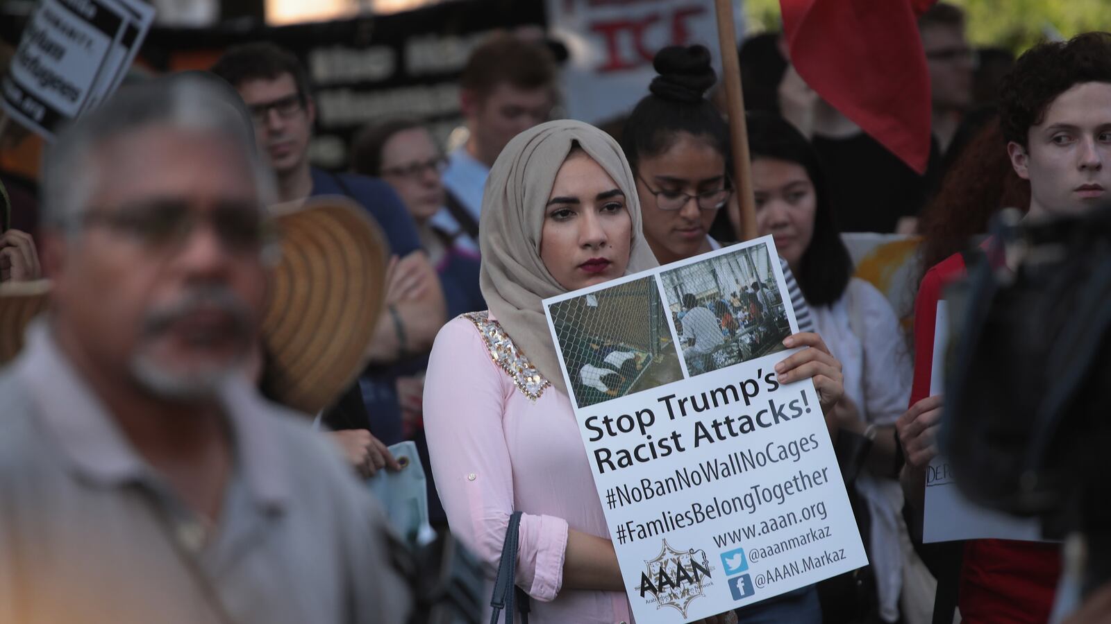 Demonstrators at a June rally in the Little Village neighborhood called for the elimination of the U.S. Immigration and Customs Enforcement. A letter circulating among public school parents warns of unintended consequences of fingerprinting school council members because of concerns over deportations.