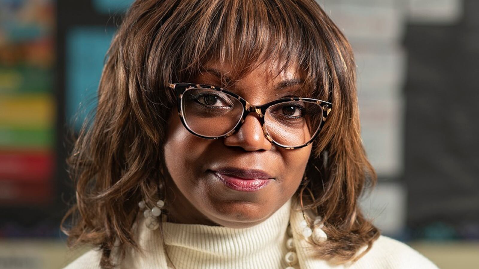 A headshot of teacher Tavia Redmond.