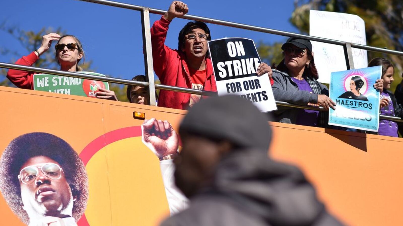 Striking public school teachers and their supporters march during the 34th annual Kingdom Day Parade on Martin Luther King Jr Day, January 21, 2019, in Los Angeles, California. (Photo by Robyn Beck / AFP/ Getty Images)