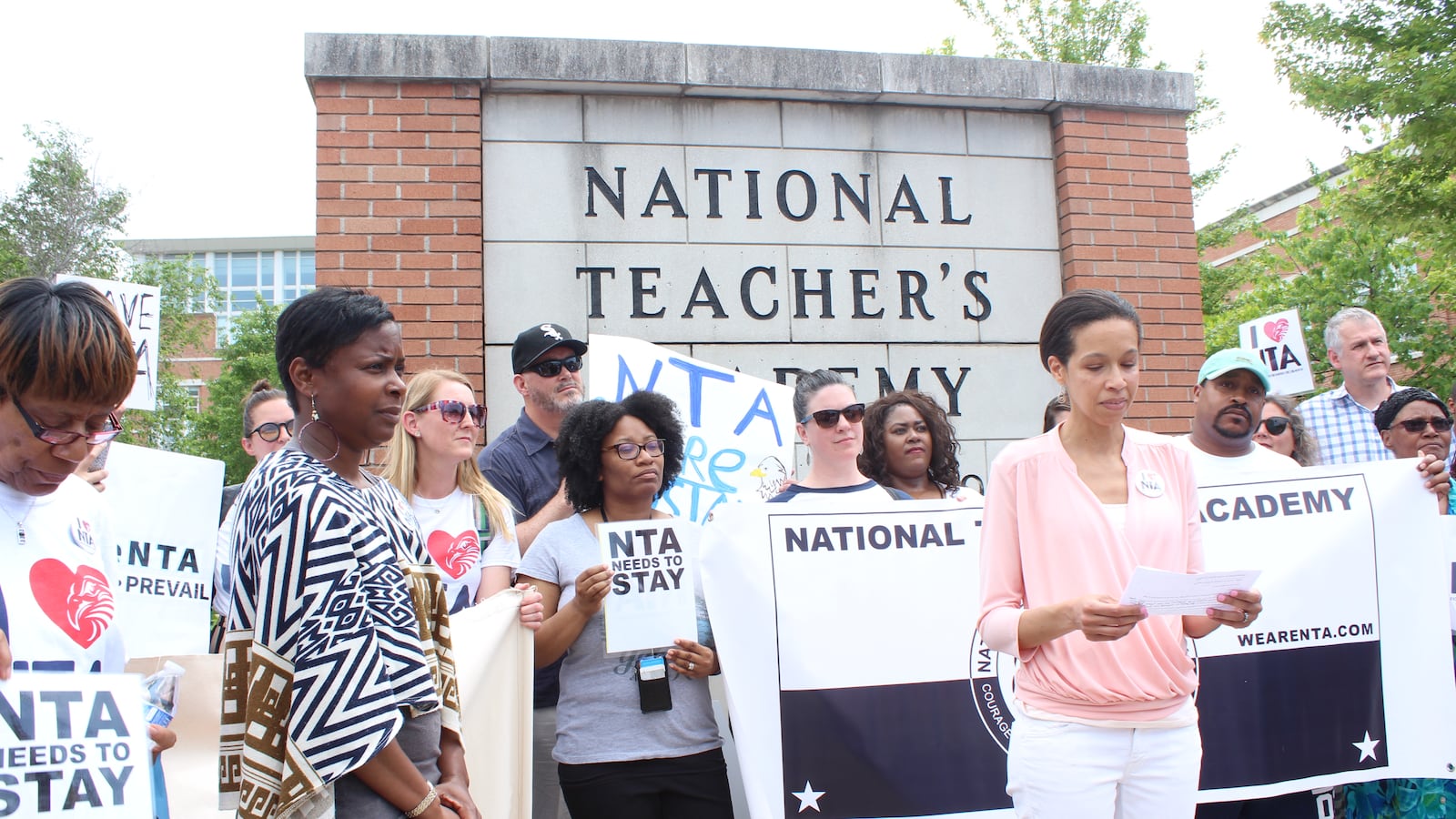 Elisabeth Greer, a parent and leader at the National Teachers Academy, speaking at a press conference in June about parents' lawsuit to stop CPS from displacing NTA with a new high school.