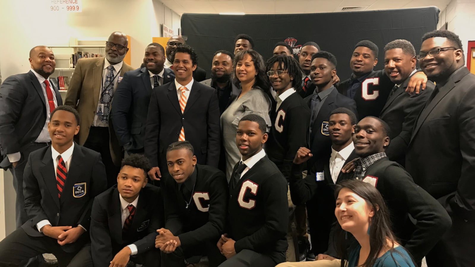 Leaders of Project Stand for formerly incarcerated students, student advocacy group Bridges, Shelby County Juvenile Court, and Shelby County Schools pose after students presented recommendations to reduce suspensions and expulsions.