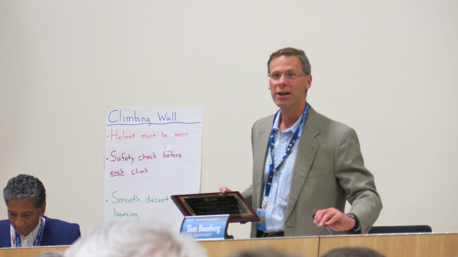 Superintendent Tom Boasberg is recognized by an association focused on healthy schools at meeting of Denver board.