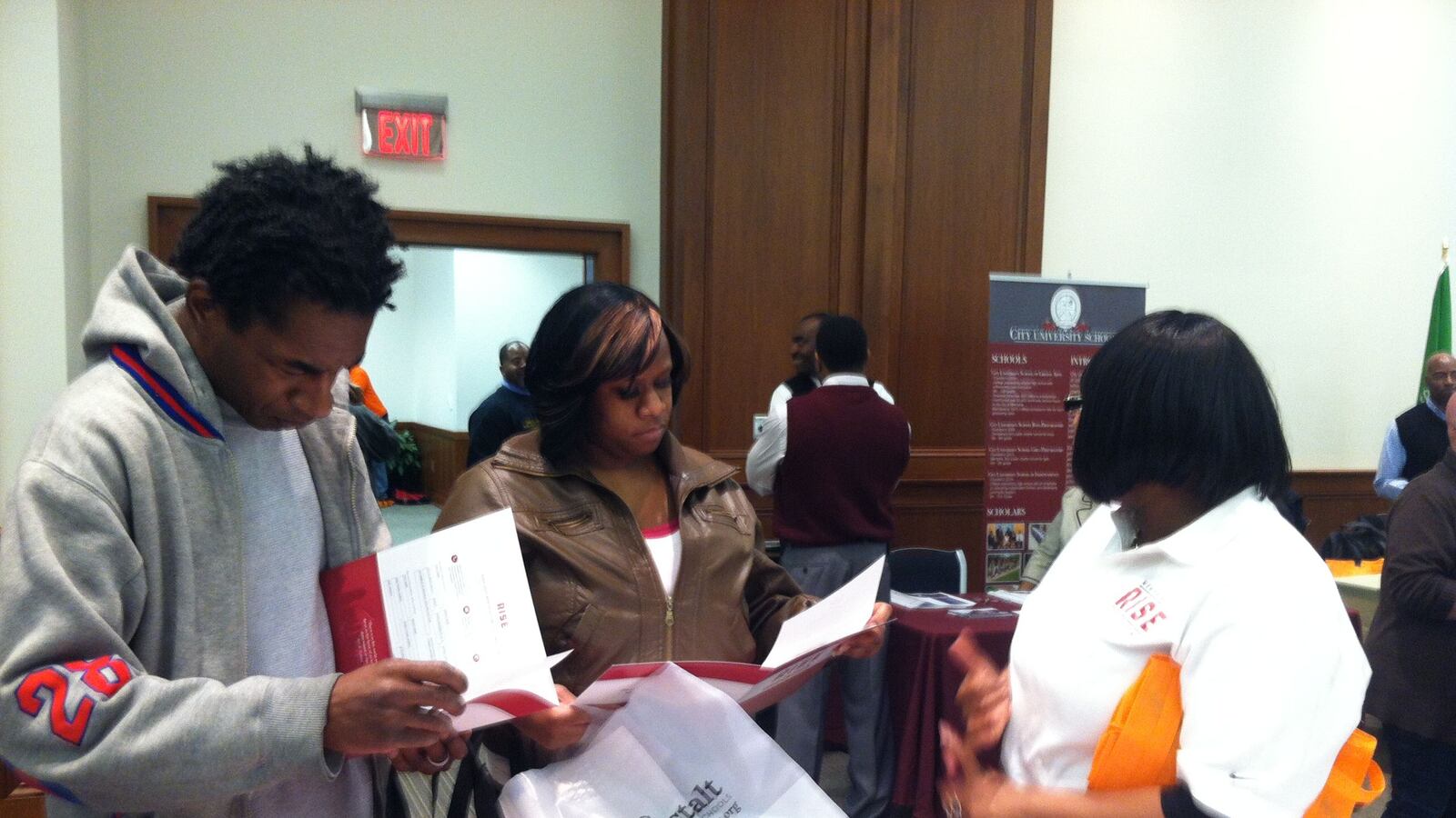 Parents talk to Memphis Rise employees about the new charter schools
