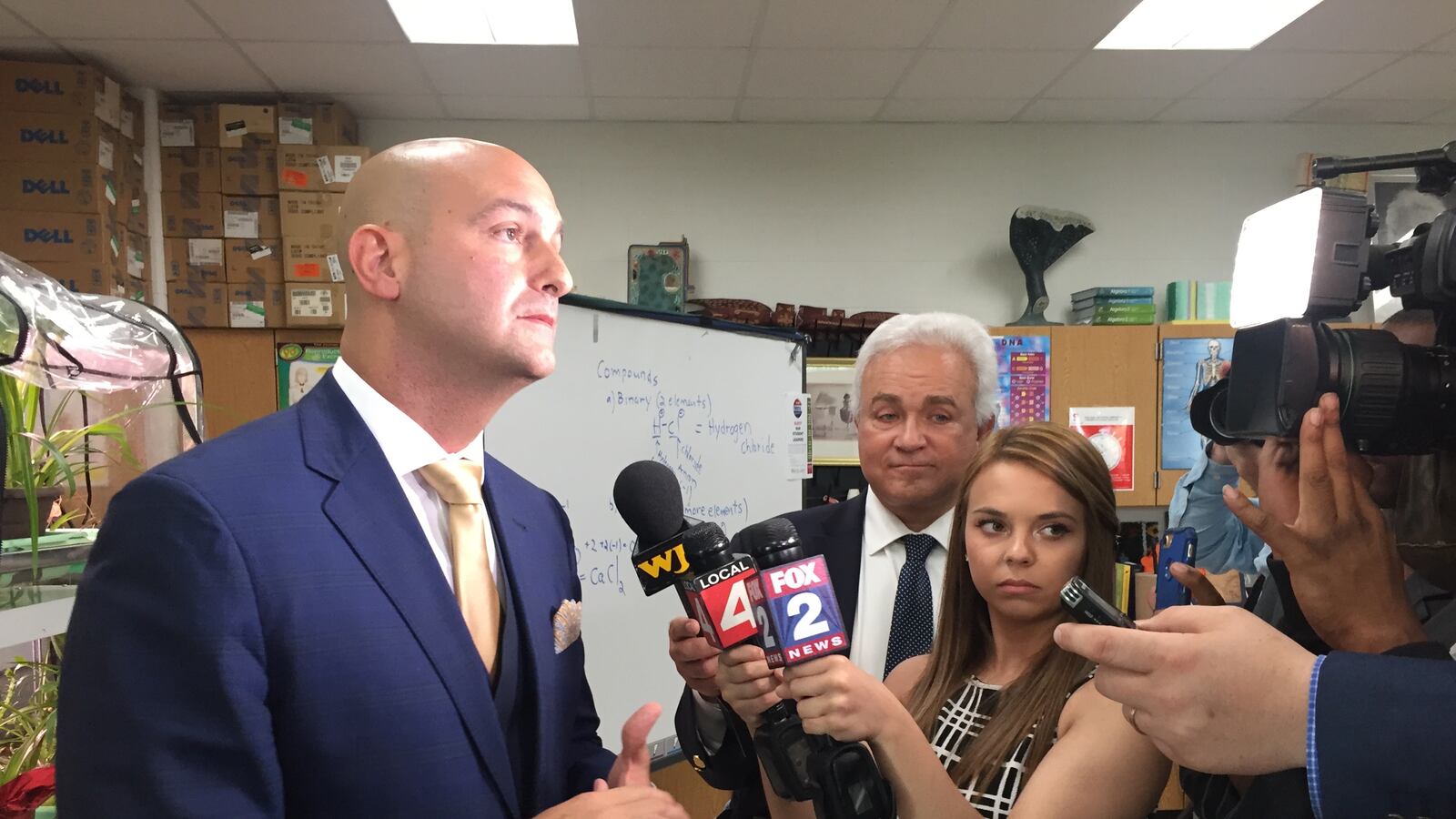 New Detroit school superintendent Nikolai Vitti addresses reporters outside a teacher hiring fair on his first full day in the job.