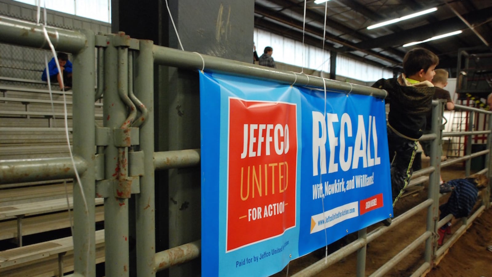 Dozens of young Jefferson County residents ran through the barn and climbed on rails during a campaign rally July 8.