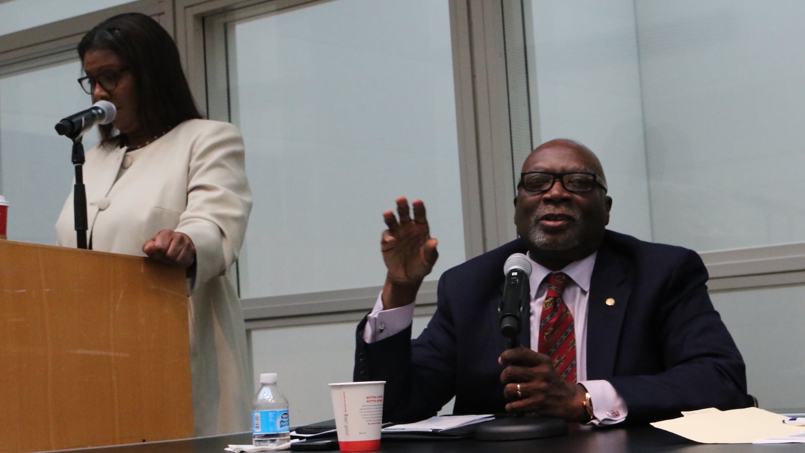 Principal union president Ernest Logan (right) criticized the city's Renewal program at a panel moderated by Public Advocate Letitia James (left).