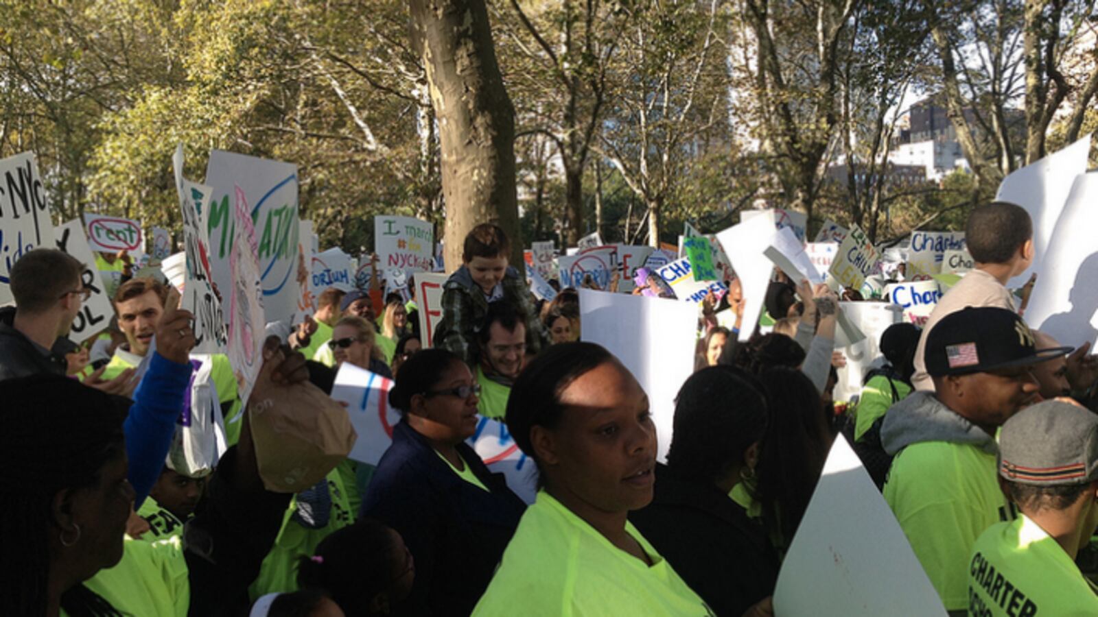 Parents and students at a charter school march across the Brooklyn Bridge last year.