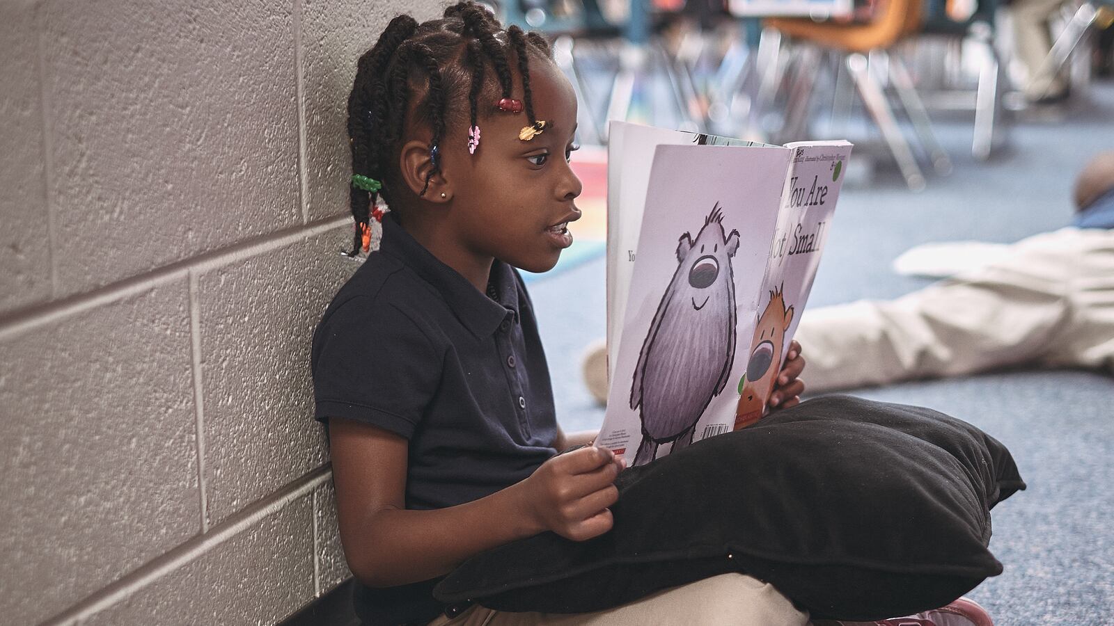 Iszzy and Elodie Oriental at a meeting of the school’s grief group.