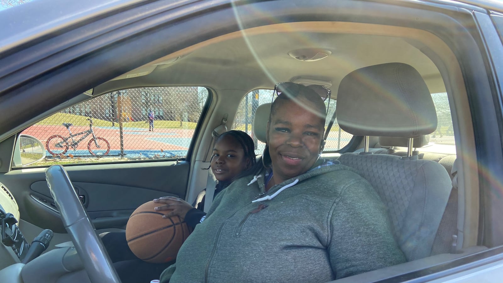 Shelly Franklin and her grandson stopped by a basketball court in Detroit on Friday afternoon. Schools across Michigan were closed to slow the spread of the coronavirus.