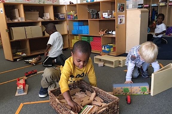 Children play in the “Bear Cubs” classroom at the Dahlia Campus preschool.